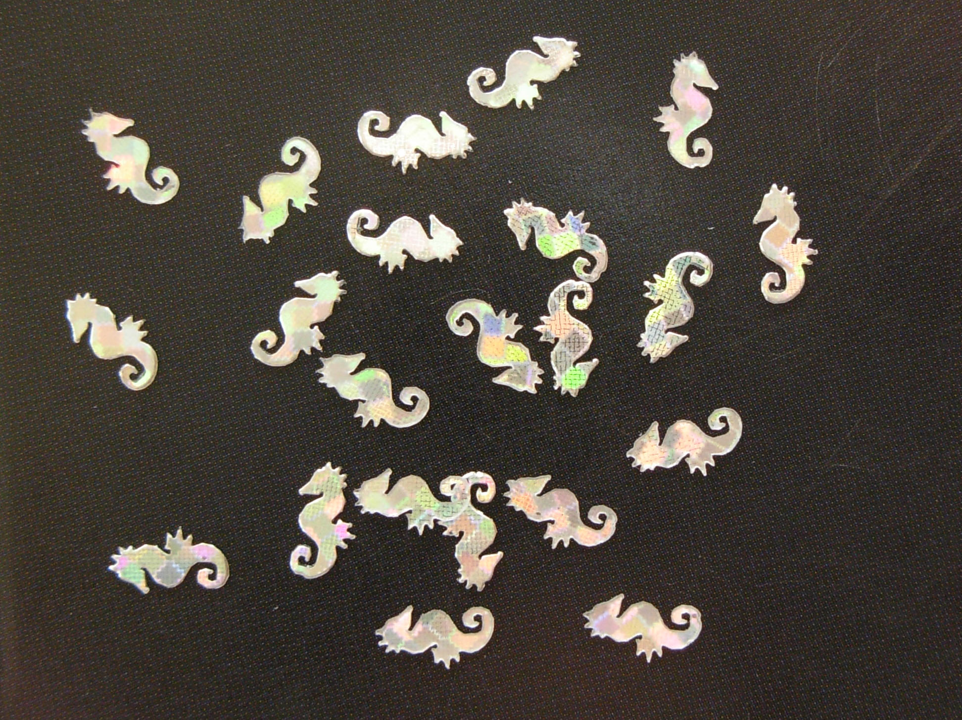 1106: Silver Hologram Sea Horses Micro Confetti